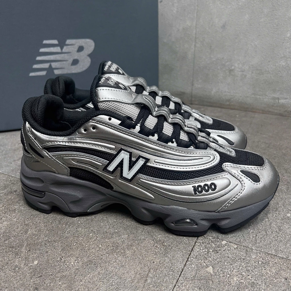 New Balance 1000 NEGRO-PLATEADO